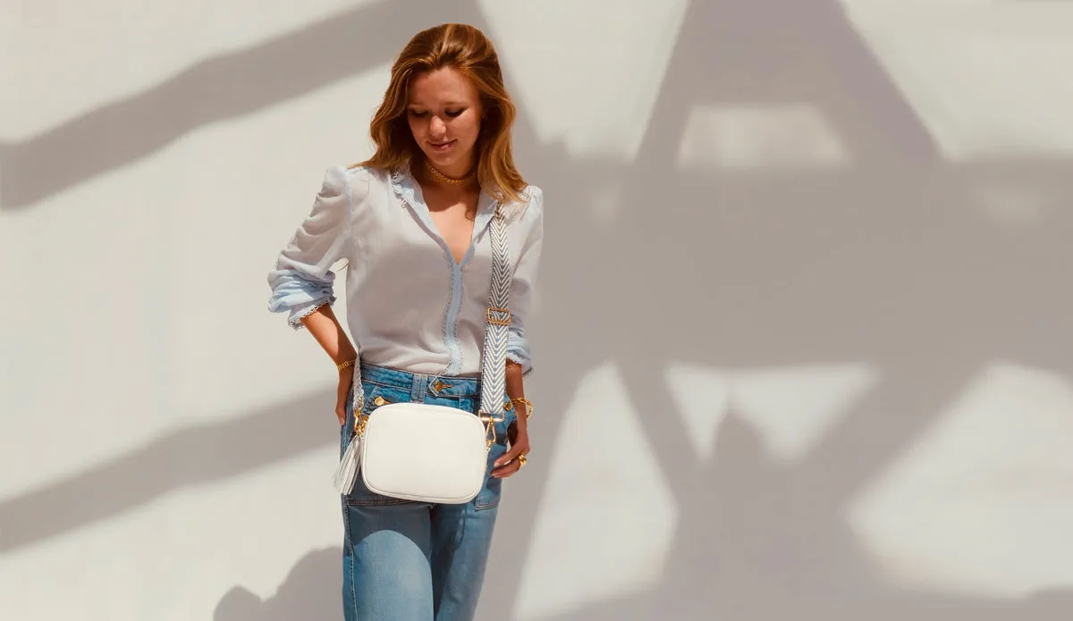 The Tassel White Leather Crossbody Bag With Denim Blue Chevron Strap