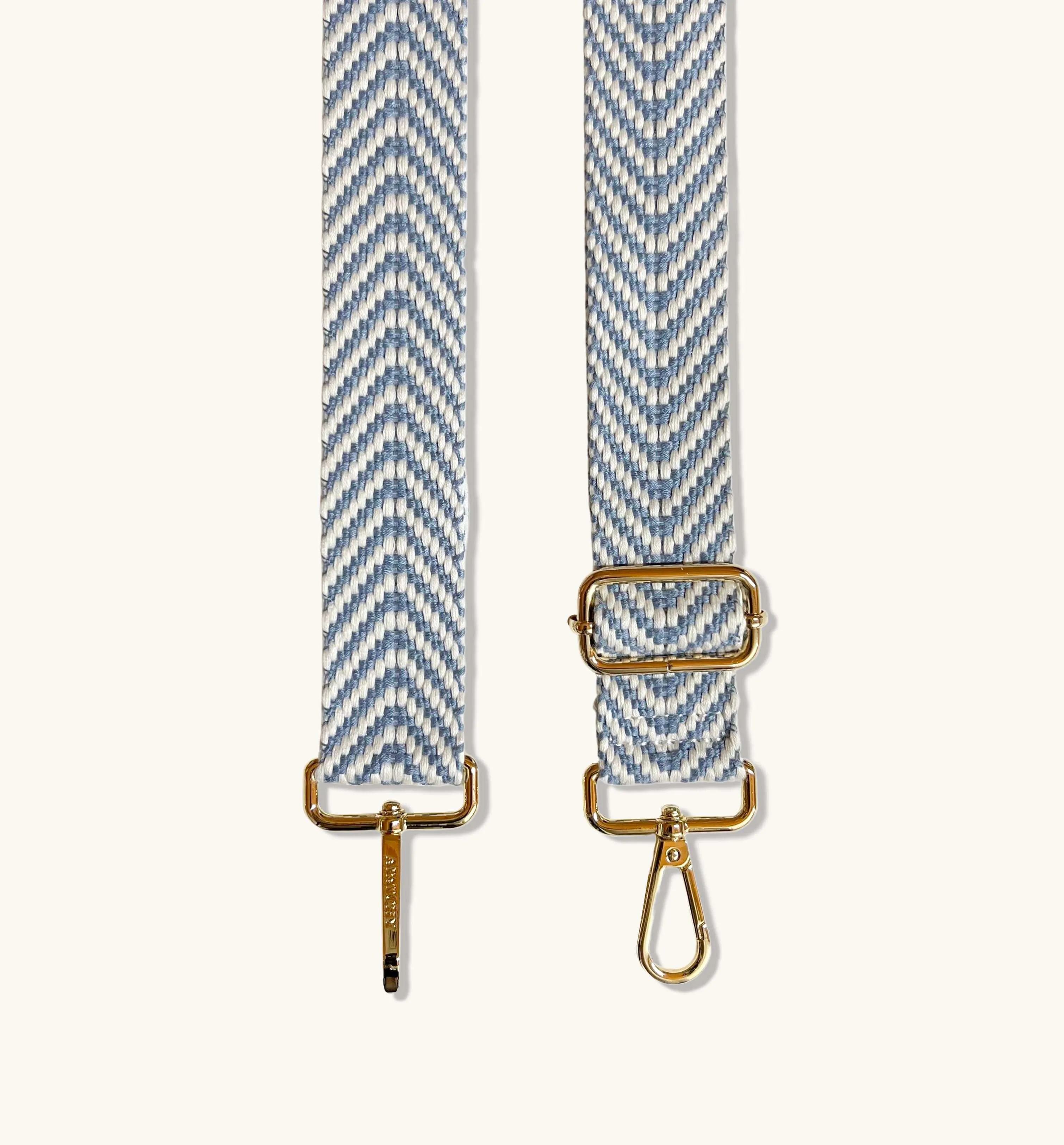 The Tassel White Leather Crossbody Bag With Denim Blue Chevron Strap